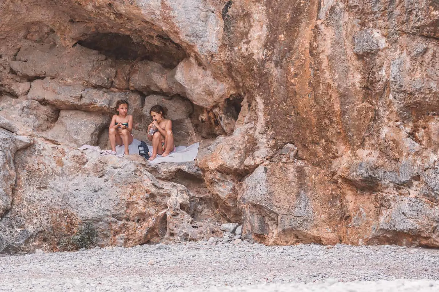 Children on beach at Sa Calobra in Mallorca