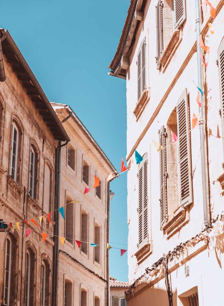 Avignon streets under a blue sky.