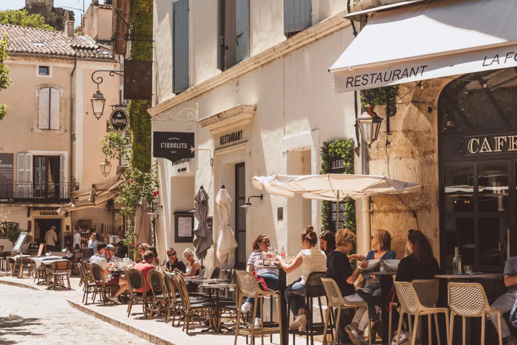 The busy streets of Lourmarin village in Provence, France